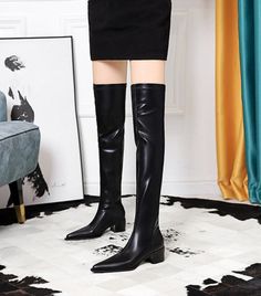 Be fashion-forward with these chic Over Knee High Boots! Made of soft vegan leather and featuring a square heel and pointed toe, these comfy boots will be your go-to accessory for every 'fit. Strut fearlessly while feeling guilt-free, because your stylish look is now animal-friendly! ​ Shaft Material: PU Outsole Material: Rubber Upper Material: PU Insole Material: PU Heel Type: Square heel Boot Height: Over-the-Knee Toe Shape: Pointed toe Fit: Fits true to size, take your normal size Closure Typ Fall Wide Calf Pointed Toe Knee-high Boots, Fitted Polyurethane Boots For Fall, Fitted Trendy Polyurethane Boots, Fall Fitted Faux Leather Knee-high Boots, Winter Wide Calf Polyurethane Boots, Fall Faux Leather Knee-high Boots For Work, Wide Calf Faux Leather Boots With Pointed Toe, Wide Calf Pointed Toe Faux Leather Boots, Pointed Toe Knee-high Faux Leather Boots