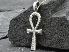 Ankh Cross Pendant made of Solid 925 Sterling Silver ☞ made to last.Matching Ring & Earrings - please ask meDetails:• Hammered Cross Pendant• Dimensions: Pendant Height 36mm, Width 17mm• Free Complimentary Chain• Solid 925 Sterling SilverSKU P-01302 Spiritual Silver Jewelry With Diamond Cut, Symbolic 925 Silver Jewelry Gift, Sterling Silver Cross Jewelry With Diamond Cut, Nickel-free Ankh Shaped Elegant Jewelry, Nickel-free Ankh Elegant Jewelry, Symbolic Diamond Cut Jewelry Gift, Nickel-free Ankh Jewelry, Elegant Nickel-free Ankh Jewelry, Handmade White Gold Cross Jewelry