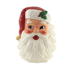 Old-Fashioned Santa Face Cookie Jar Wearing A Red Stocking Cap Accented With Gold Bells On The End A Sprig Of Holly On The White Brim.. Purchase includes One Cookie Jar. Cookie Jar Christmas, Santa Cookie Jar, Jars For Sale, Santa Cookie, Red Stockings, Christmas Tabletop, Stocking Cap, Santa Cookies, Christmas Jars