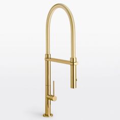 a gold faucet on a white background with the handle extended to it's side