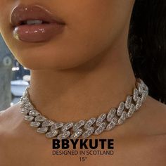 The 16mm Cuban Baguette Necklace is an upgraded version of the classy Cuban Link Necklace. Featuring both the round cut and the baguette-shaped prong-set stones. This is a statement piece that will do the talking for you. DESIGNED IN SCOTLAND BY BBYKUTE Luxury Diamond Necklace With Baguette Cut Diamonds, Luxury Classic Diamond Necklace With Curb Chain, Luxury Diamond Necklace For Party, Luxury Chain Jewelry For Parties, Elegant Diamond Jewelry With Chunky Chain, Trendy Silver Iced Out Jewelry, Luxury Silver Rhinestone Necklace With Cubic Zirconia, Elegant Cuban Link Chain Necklace For Parties, Trendy Diamond Jewelry With Bling