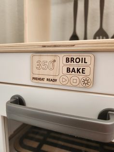 an oven door with a sign that says broil bake and the words, 350 degrees