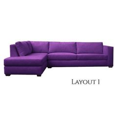 a purple couch sitting next to a white wall with the words layout on it