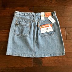 Brand Nwt! Levi's Retro Mini Skirt - Adorable 70's Style Mini With Straight Cut Pockets And Zip Closures. Soft, Light Blue Stonewashed Denim. Designed To Be Worn On Hip. 18" Long. 17.5" Across Top Of Waist (Flat)/21.5" Widest Part Of Hip (Flat). 100% Cotton. Machine Wash Levi's Mid-rise Casual Skirt, Levi's Casual Mid-rise Skirt, Relaxed Vintage Skirt With Pockets, Fitted Levi's Mini Skirt, Retro High Waist Spring Skort, Retro High Waist Skort For Spring, High Waist Retro Skort For Spring, Levi's Casual Mini Skirt, Levi's Casual Denim Skirt