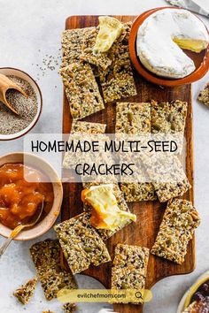 homemade multi - seed crackers on a cutting board