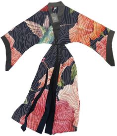 Now offered in silk, come take a look at our secret garden kimono. An inspirational escape from the chaos that surrounds our busy world. Buzzing in vibrant tones with an overlay of zebra print, why not? It seemed to work perfectly for you hummingbird lovers out there so we created it just for you. Be free and come savor the nectar of our beautiful design in this exclusive kimono.  100% Silk Pockets/sash included This style was first introduced to our brand in 2021 by this original kimono pattern Multicolor Silk Kimono With Kimono Sleeves, Elegant Multicolor Printed Kimono, Summer Black Silk Kimono, Black Silk Summer Kimono, Black Silk Kimono For Summer, Elegant Multicolor Silk Kimono, Black Silk Kimono For Spring, Kimono Pattern, Our Secret