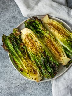 grilled vegetables on a plate with a napkin