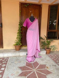 pink buti Chiffon silk saree with hand embroidery blouse |modern silk saree with readymade blouse | sarees USA | pure light weight silk saree / pink saree with blue stitched blouse / voggish / elbow sleeve maggam blouse      you are absolutely gonna fall in love with this unique modern  saree look with our stitched ready to wear blouses(includes the price) with a modern touch to them is perfect for your upcoming saree occassion that really makes you stand apart in crowd !!     You dont really ne Festive Pink Cotton Silk Sharara, Pink Cotton Silk Sharara For Diwali, Pink Fitted Cotton Silk Sharara, Fitted Pink Cotton Silk Sharara, Pink Tissue Silk Pre-draped Saree In Traditional Drape, Pink Tissue Silk Pre-draped Saree, Pink Tissue Silk Pre-draped Saree In Traditional Style, Pink Anarkali Style Silk Pre-draped Saree, Festive Pink Silk Pre-draped Saree