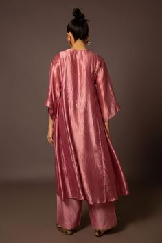 Rose pink dupion silk kurta with pitta hand embroidered neckline and side panels. Comes with pant.
Components: 2
Pattern: Hand embroidered
Type Of Work: Pitta
Neckline: Notched
Sleeve Type: Flared Sleeves
Fabric: Dupion silk
Color: Pink
Other Details: 
Model Height: 5ft 11inches, wearing size S
Closure: Kurta - Front button
Occasion: Mehendi and Haldi - Aza Fashions Pink Dola Silk Kurta With Cutdana, Pink Silk Embellished Kurta, Pink Semi-stitched Long Sleeve Kurta, Pink Chanderi Kurta With Cutdana Detail, Pink Silk Kurta With Cutdana Detail, Silk Kurta, Dupion Silk, Embroidered Neckline, Pant Set