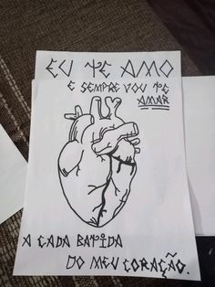 a piece of paper with a drawing of a heart on it