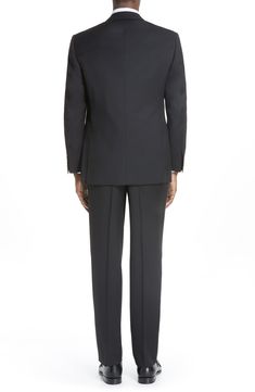 Finely textured wool elevates a polished Italian suit featuring flat-front trousers paired with a two-button, notch-lapel jacket. Style Name:Canali Classic Fit Solid Wool Suit. Style Number: 523463. Sleek Formal Pantsuit With Pressed Crease, Formal Tuxedo-style Pantsuit With Structured Boning, Tuxedo Style Formal Pantsuit With Structured Boning, Workwear Tuxedo With Notch Lapel And Pressed Crease, Modern Notch Lapel Pantsuit For Formal Occasions, Formal Wool Three-piece Suit Flat Front, Wool Suit With Lapel Collar For Black-tie Events, Wool Blazer For Black-tie Events With Notch Lapel, Formal Pantsuit With Structured Boning And Suit Collar