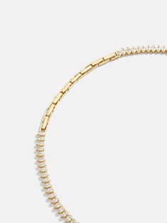 Meet the Julia 18K Gold Adjustable Tennis Necklace: both classic and delicate, this piece is crafted from extra luxe materials. Each Cubic Zirconia stone is designed in a modern teardrop shape. Even better? Its gold hardware is made of 18K gold plated sterling silver, meaning this piece will last you for years to come.ABOUT OUR ADJUSTABLE NECKLACES: Our inventive, one-of-a-kind box clasp extender allows for maximum versatility. This necklace can be styled as short as 13" and as long as 15". Whet Silver Meaning, Gold Choker Necklace, Box Clasp, Tennis Necklace, Gold Choker, Adjustable Necklace, Collar Necklace, Gold Plated Sterling Silver, Bracelet Sizes