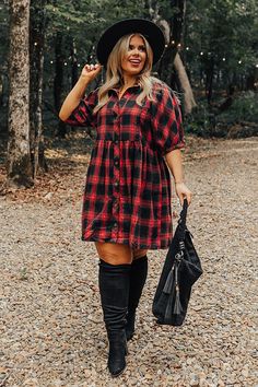 - This beautiful plaid dress has arrived just in time for cider season! - Unlined material with a plaid print - A collared neckline - A button-up front - Short sleeves with elastic cuffs - A relaxed silhouette that ends in a mid-thigh length hemline Flannel Christmas Party Theme Outfit, Western Christmas Outfits Women, Plaid Dress Outfit Winter, Cute At Home Outfits, Red Fall Dress, Plaid Dress Outfit, Plaid Dresses, Plus Size Fall Outfit, Country Holiday