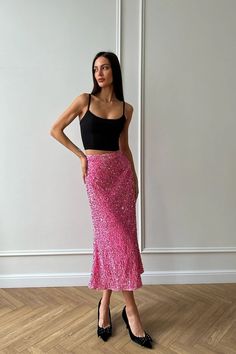 Godet skirt in midi length in pink color. Fitted silhouette flares downwards. Sequins embroidered sparkling fabric looks spectacular and luxurious. Invisible zipper fastener. Embellished Flowy Party Skirt, Party Embellished Flowy Skirt, Glamorous Embellished Long Skirt, Glamorous Long Embellished Skirt, Chic Pink Sequin Skirt, Pink Long Skirt For Night Out, Chic Pink Skirt For Cocktail, Chic Pink Maxi Skirt For Night Out, Embellished Pink Evening Bottoms