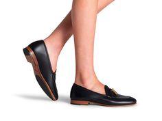 Introducing the "Stella Lock" loafer, a timeless apron toe design adorned with a charming lock ornament. With a low stacked heel and easy slip-on style, the Stella Lock offers both comfort and elegance. Perfect for the office or a chic weekend alternative, these loafers effortlessly elevate any outfit. Experience the perfect blend of tradition and contemporary flair with the Stella Lock. Elegant Business Flats With Low Heel, Elegant Low Heel Flats For Business, Luxury Low Heel Flats For Work, Timeless Almond Toe Tassel Loafers For Office, Chic Almond Toe Tassel Loafers For Formal Wear, Chic Almond Toe Tassel Loafers For Formal Events, Chic Almond Toe Tassel Loafers For Formal Occasions, Elegant Low Heel Flats For Office, Timeless Almond Toe Tassel Loafers For Workwear