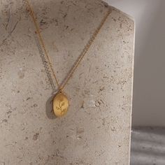 The most beautiful way to represent your loved ones. These Birth Flower Necklaces feature an engraved flower design that represents each month. This necklace is so charming you'll want to collect one for each of your loved ones. DETAILS & SIZE Composition: 18k gold plated over 316L Stainless steel Measurements: irregular pendant: 18x11mm; chain: 16" + 2" extension Lobster claw clasp Read about how to care for your jewelry here. Shop the Personalized Collection! Or shop Necklaces to start your ne Flower Gold Necklace, Floral Zodiac, Flower Necklaces, Engraved Flower, Oval Necklace, Necklace Flower, Month Flowers, Birth Month Flowers, Waterproof Jewelry