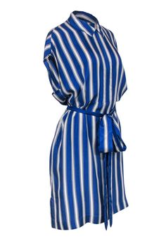 Go nuts for nautical with this frock from Escada! Made with a chic striped design in a preppy shirt-style silhouette, this summery beauty is perfect for your next swanky soiree in the Hamptons! Pair with woven wedges and a straw bag for some serious seaside style. Size L 100% Silk Concealed front zipper Unlined Shirt-style silhouette Collared neckline Sleeveless Open pockets on sides of waist Striped design Matching tie belt Bust 46" Waist 38" Shoulder to hem 40" Escada Dress, Preppy Shirt, Seaside Style, Silk Shirt Dress, Silk Shirt, Stripes Design, The Hamptons, Nuts, Straw Bag