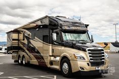 an rv is parked in a parking lot