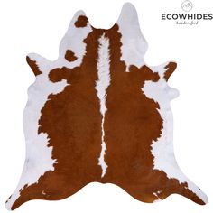 a brown and white cowhide rug on a white background