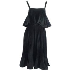 This gorgeous Nina Ricci haute couture dress is made of silk and is entirely pleated. It has thin straps and a ruffle flounce over the bust. The piece is in excellent condition with minimal wear. Size 4, 1986. Measurements Bust: 35" Waist: 28" Length: 43" (top of strap to hem) Silk Pleated Dress, Silk Black Dress, Haute Couture Dress, Black Silk Dress, Haute Couture Dresses, Velvet Maxi Dress, Couture Dress, 1950s Fashion, Couture Dresses