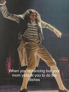 a man with long hair is dancing on stage and the words, when you're dancing but your mom yells at you to do the dishes