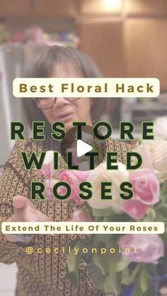 a woman holding flowers in her hands with the words best floral hack restore wild roses