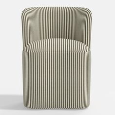 an upholstered chair with stripes on it