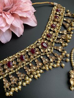 This is a beautiful Choker that comes with a set of earrings and maangtika. Can be worn on any outfit or for a bridal look as its a complete set. Festive Kundan Bridal Accessories For Diwali, Traditional Bridal Accessories With Stone Work For Festive Occasion, Festive Kundan Bridal Accessories For Party, Festive Kundan Bridal Accessories For Ceremonial Use, Festive Kundan Bridal Accessories For Ceremonial Occasion, Bridal Accessories With Stone Work For Festive Occasions, Festive Bridal Accessories With Stone Work, Festive Kundan Sets With Hand Set Detailing, Festive Hand Set Lehenga For Diwali