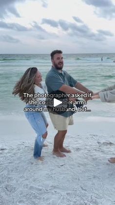 a man and two women holding hands on the beach with an ocean in the background