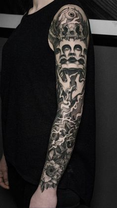 a man with a tattoo on his arm