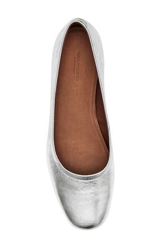 Tonal stitching loops around the topline of this poised ballet flat crafted from supple metallic leather with a debossed logo detail on the back. Leather upper and lining/synthetic sole Imported Silver Leather Ballet Flats For Spring, Silver Leather Ballet Flats For Formal Occasions, Silver Leather Flats For Work, Silver Leather Slip-on Ballet Flats, Debossed Logo, Womens Ballet Flats, Ballet Flat, Metallic Leather, Ballet Flats