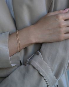 Double beaded chain layered bracelet. Modern, dainty and delicate great as an everyday bracelet from E&E PROJECT. Bracelet comes in 2 beaded satellite chain strands, wear it alone or layered with other bracelets. Gold filled or Sterling Silver Minimalist Delicate Chain Bracelet For Layering, Adjustable Double Chain Bracelet For Everyday, Adjustable Double Strand Dainty Bracelet, Minimalist Beaded Chain Bracelet With Round Beads, Minimalist Adjustable Chain Bracelets For Layering, Tiny Beads Multi-strand Bracelet, Dainty Beaded Bracelets With Ball Chain, Delicate Round Beads Chain Bracelet, Everyday Double Chain Bracelet