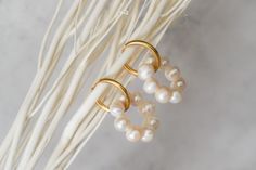 #jewelry #jewelrydesigner #pearl #pearljewellery #hoopearrings #earrings #womenjewelry #wedding #bridaljewellery #bridesmaid Dainty Yellow Gold Hoop Earrings For Wedding, Small Hoop Yellow Gold Earrings For Wedding, Hoop Earrings With Pearl Charm For Wedding, Round Hoop Earrings With Pearl Charm For Wedding, Gold Hoop Pearl Earrings For Wedding, Small White Hoop Earrings For Wedding, White Huggie Earrings For Wedding, Yellow Gold Pearl Drop Huggie Earrings For Wedding, Yellow Gold Huggie Earrings With Pearl Drop For Wedding