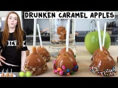 a woman standing in front of three caramel apples with candy on them and the words drunk caramel apples