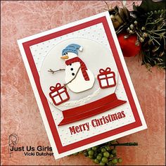 a christmas card with a snowman on it