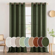 the curtains in this room have different colors and patterns on them, including dark green