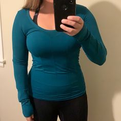 Never Been Worn But Did Try On. I Like The Fit But I Like A Difference Neckline For Me Personally. Thumb Holes And Breathable Panels On The Back, Sides And Sleeves. Beautiful Blue/Green Me Personally, Thumb Holes, Try On, Beautiful Blue, Long Tops, Blue Green, Long Sleeve Tees, Blue Color, Womens Tops