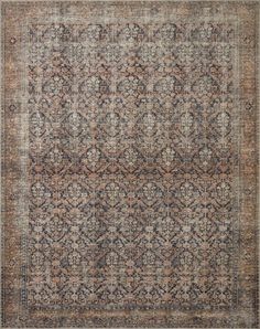 an antique rug with many different colors and patterns