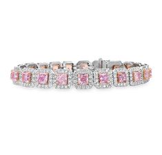 Pink diamonds are among the most sought-after gemstones in the world, celebrated for their rarity and the natural beauty of their color. This magnificent line bracelet comprises 20 dazzling pink natural diamonds—the pinnacle of luxury in a classic design. Each of these gems is certified by the GIA as natural fancy pink, with accompanying hues ranging from purple to orange, collectively weighing 6.47 carats. Complementing the pink diamonds are 3.01 carats of pristine white diamonds, creating a da Luxury Pink Gold Fine Jewelry Bracelets, Luxury Fusion Jewelry For Promise, Luxury Pink Tennis Bracelet In Fine Jewelry Style, Luxury Pink Jewelry For Festive Season, Luxury Pink Jewelry With Baguette Diamonds, Luxury Pink Tennis Bracelet For Formal Occasions, Luxury Mother's Day Jewelry With Diamond Accents, Luxury Pink Sapphire Fine Jewelry Bracelet, Pink Diamond Bracelet