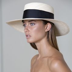 The Ibiza is this season’s playful reimagining of the classic Panama hat, featuring a wider than usual band for a fresh, sophisticated look. HANDMADE IN ECUADOR 100% NATURAL TOQUILLA STRAW BRIM SIZE: 4" SIZE-ADJUSTABLE INNER BAND White Boater Hat With Flat Crown For Spring, White Straw Hat For Spring With Flat Crown, Classic Spring Hat With Flat Crown, White Flat Crown Sun Hat For Spring, Modern Beach Hats For Summer, White Boater Hat With Flat Crown For Summer, Classic White Boater Hat For Spring, Fitted Flat Crown Panama Hat For Beach, Modern Summer Beach Hats