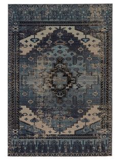 a blue and beige rug with an intricate design