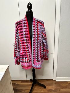 This is a handmade crochet hexi cardigan that fits large-x-large, depending on your preference Crochet Hexi Cardigan, Hexi Cardigan, Crocheted Sweaters, Hexagon Cardigan, Crochet Hexagon, Crochet Jacket, Crochet Sweater, Crochet Ideas, Jumpers And Cardigans