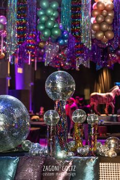 disco balls and other decorations are on display