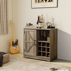 a living room with a guitar and wine rack