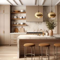 a kitchen with marble counter tops and gold pendant lights hanging from the ceiling over the island