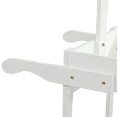 the back end of a white chair with two arms and one arm extended to it