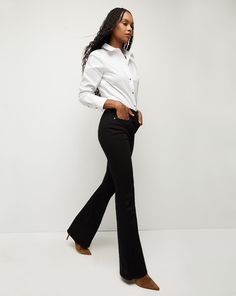 In a sophisticated dark wash, the Beverly jean features a high-rise waist that is fitted through the hips and thighs with a subtly flared leg. High quality stretch denim offers a flattering look with a flexible fit. Tuck in any of our tops and add sky-high heels for an elongating silhouette. Dark Wash Flare Pants For Work, Chic Mid-rise Jeans For Business Casual, Elegant Wide Leg Flare Jeans For Work, Classic Dark Wash Flare Jeans For Work, Elegant Mid-rise Dark Wash Flare Jeans, Elegant High Rise Jeans For Work, Elegant High Rise Flare Jeans For Fall, Elegant High-rise Flare Jeans For Fall, Elegant High Rise Jeans