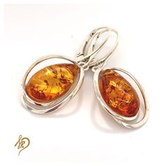 Beautiful and unique Earrings with Baltic Amber. These earrings are made of sterling silver 925 and one and only Baltic Amber from Poland. Amber in earrings all are very unique - there are small chances that You can find exactly the same earrings. Special jewels for special ladies! Amber cabochons are available in different colors (cognac, green). Amber is a very special stone and each of them could look little bit different from another - what is definitely its advantage. I tried to pick 2 the Oval Sterling Silver Earrings With Polished Finish, Classic Amber Sterling Silver Earrings, Elegant Amber Sterling Silver Earrings, Amber Sterling Silver Dangle Earrings, Amber Sterling Silver Earrings, Amber Crystal, Lapis Lazuli Ring, Crystal Healing Stones, Amber Earrings