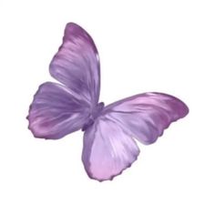 a purple butterfly flying through the air