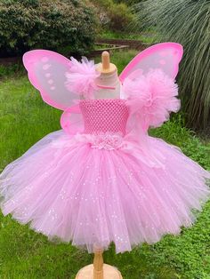 Welcome to Baby/Infants Clothing  by Funkids&Us Boutique ` This tutu  dress is super cute and adorable it is perfect for  birthdays, photographs, Halloween party  or everyday dress up.dress up!  This tutu dress is made premium tulle of pink and glitter pink tulle   with pink crochet top. I make sure that my Tutu dress is very full and fluffy!! ..  the crochet bodice top is design with fabric flowers. I also made a matching headband and fairy wand  Kids really love this costume and you bring smil Fairy Dress Kids, Pink Fairy Dress, Baby Tutu Outfits, Pink Tutu Dress, Handmade Tutu, Girls Tulle Dress, Pink Fairy, Glitter Flowers, Girls Dress Up